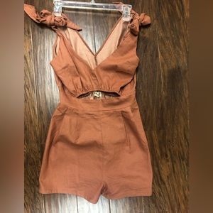 B Original romper. Size Small.